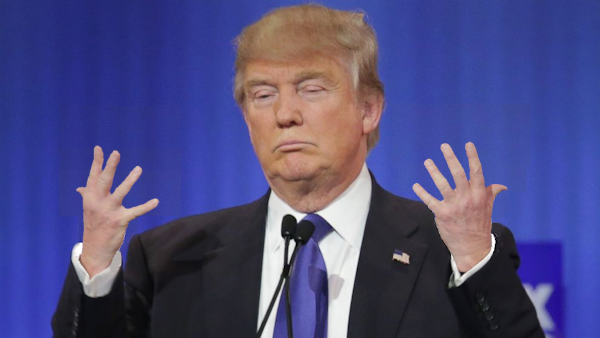 A tired and pouty President Trump is caught with his teensy hands on full display.